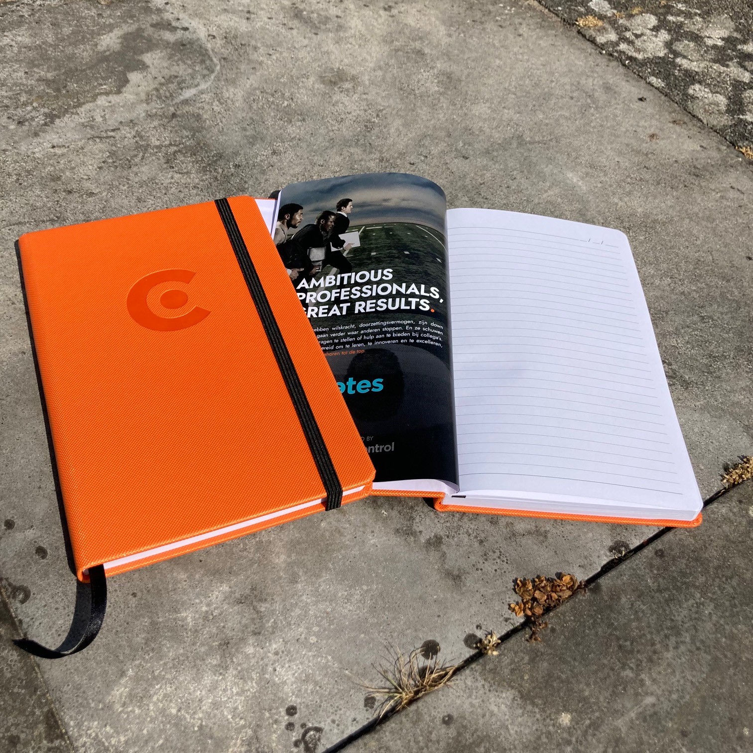 notitieboek oranje met logo preeg