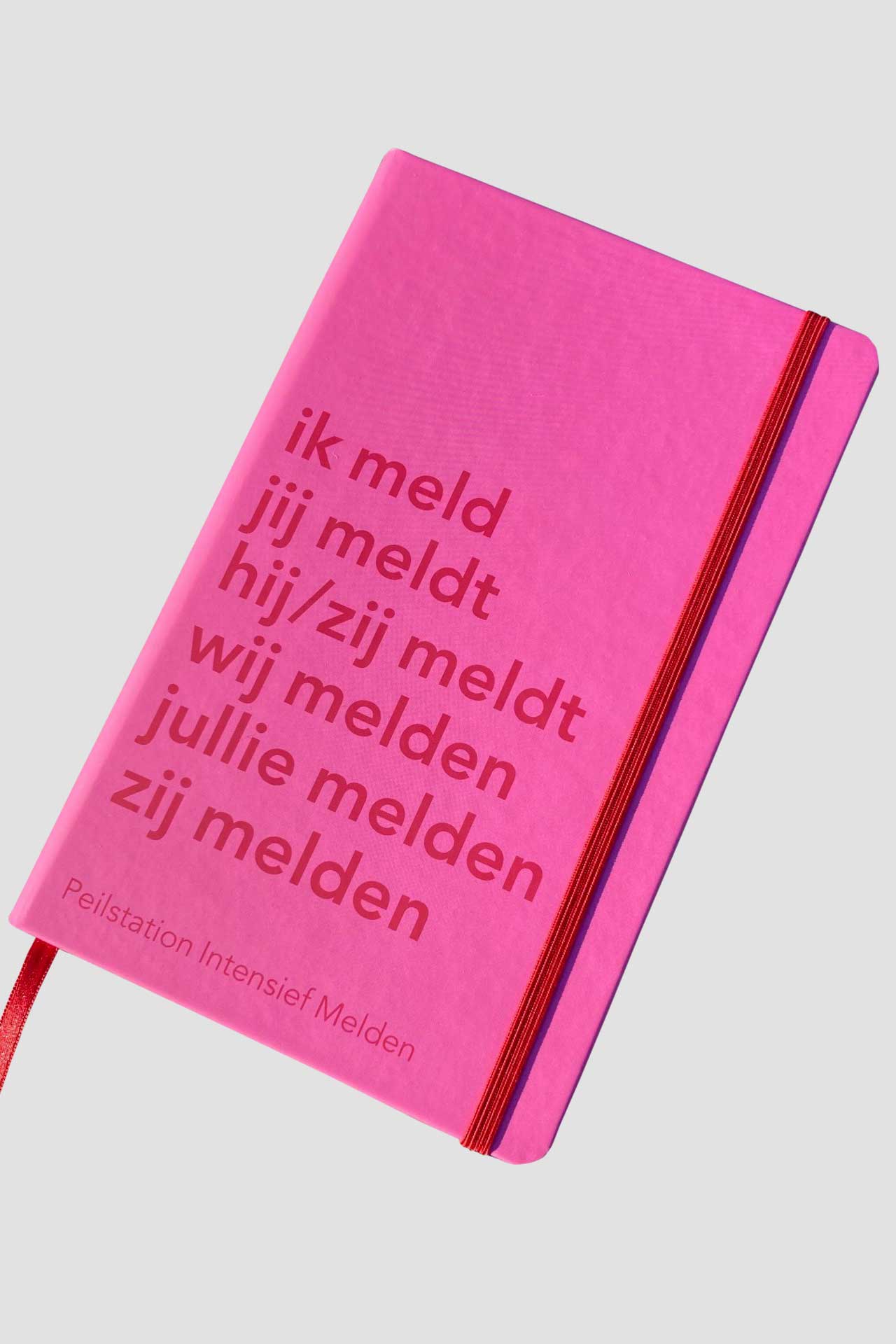 Mix&Match, type CMYK roze rood notitieboek met een tekst in blinddruk.